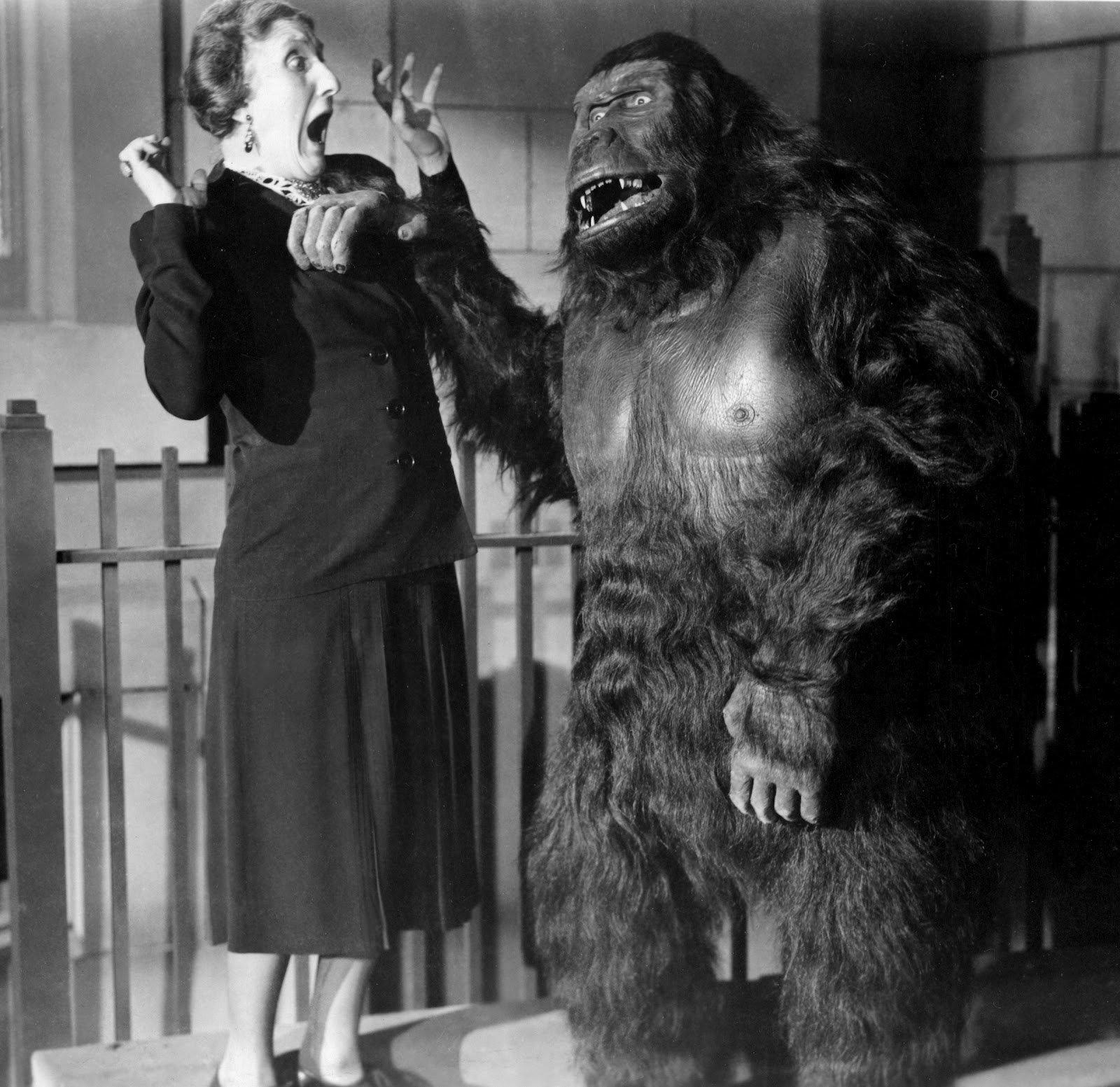 Woman screams at man in gorilla suit