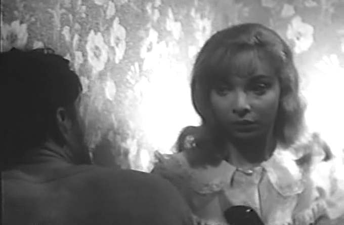 Arlene Martel in The Glass Cage tries to shake off the advances of King Moody